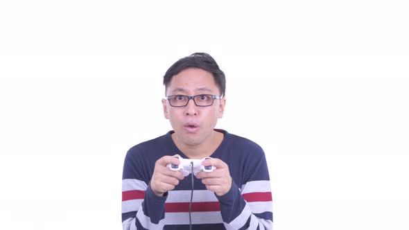 Face of Japanese Hipster Man with Eyeglasses Playing Games