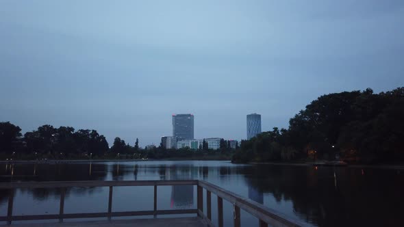 Walking on a pontoon on lake.Wooden structure on water.