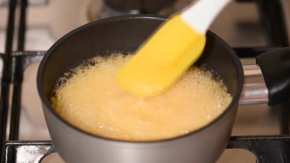 Boiling And Bubbling Sugar Syrup. Making Caramel