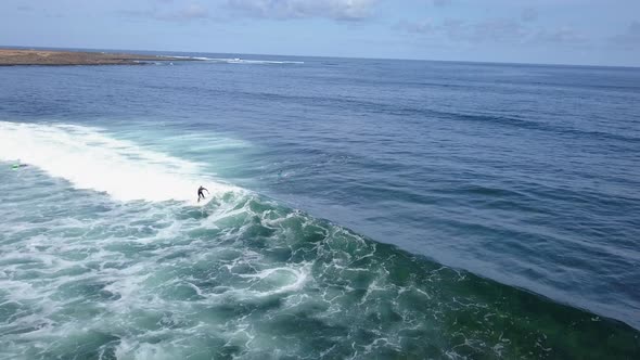 A View From Above of the Surfers in the Ocean