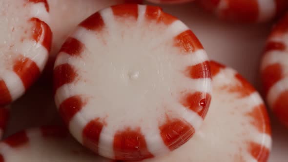 Rotating shot of peppermint candies - CANDY PEPPERMINT 056