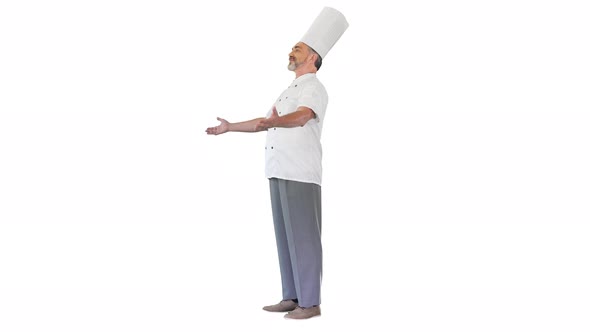 Smiling Chef Welcomes Guests To His Restaurant on White Background