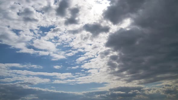 Clouds Move Smoothly in the Blue Sky. Timelapse. Cloud Space.