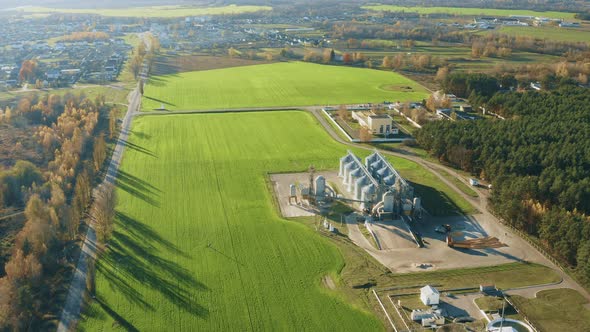 Aerial View Modern Granary Graindrying Complex Commercial Grain Or Seed Silos In Sunny Rural