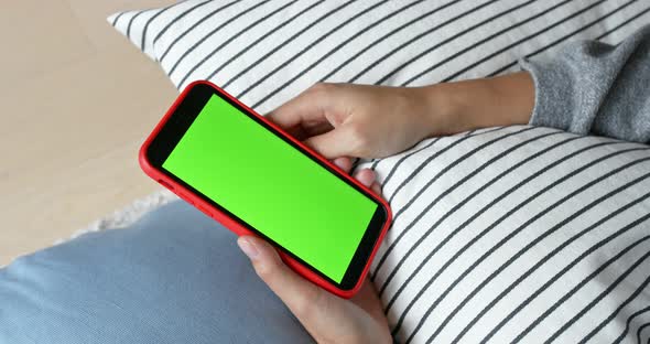 Woman Hold with Cellphone with Green Screen