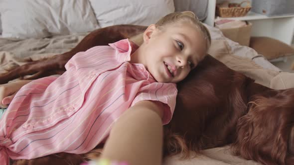 POV of Girl with Dog at Home