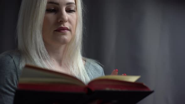 Woman Reading the Holy Bible Reading a Book