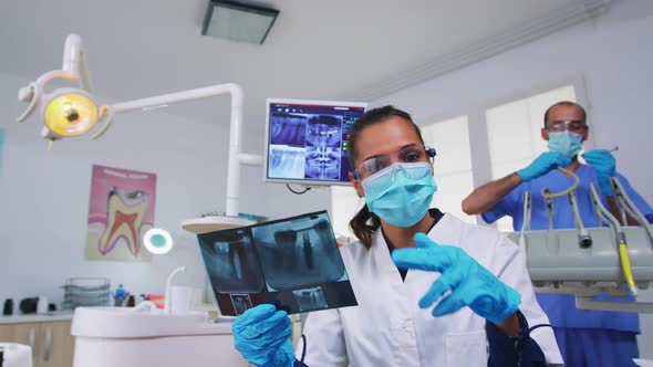 Patient Pov in Dental Office Planning Surgery Looking at Xray