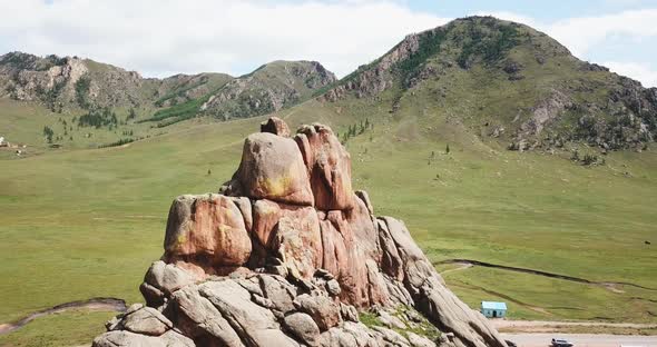 Terelj Park Rocks and Steppe Near Ulaanbaatar Mongolia. Summer Autumn Sunny Blue Sky Clouds