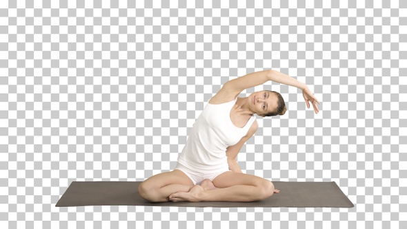 Beautiful woman practice yoga in lotus pose stretching hand