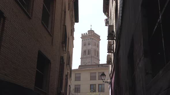 Tower seen behind buildings