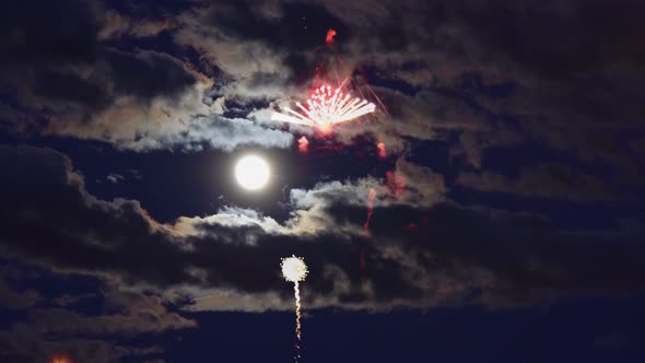 Full Moon and the Cloud Move Beautiful Fireworks Show on Independent Day