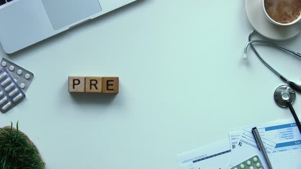 Prevention Word Made of Wooden Cubes Stop Motion, Vaccination Awareness Top View