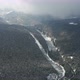 Winter road with pines in Bucin Transylvania aerial - VideoHive Item for Sale
