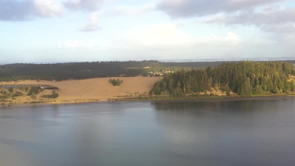 Oregon Dunes National recreation area. Drone flying over bay.