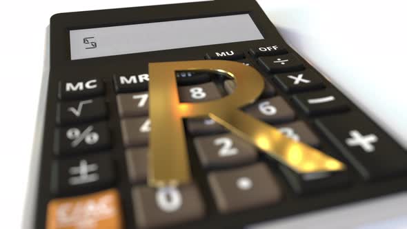 SAVINGS Text on Calculator Display and Rand Money Symbol