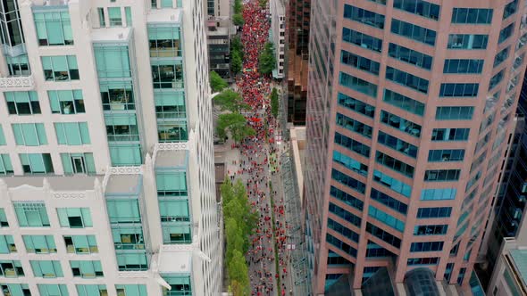 Native Activists March in Downtown Vancouver on Canada Day, Cinematic Drone Reveal of the Moving Cro