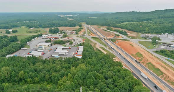 Aerial view with heavy machinery joining the reconstruction of 85 highway