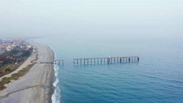 Aerial view of a jetty in the ocean