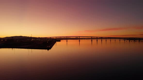 San Diego Coronado Bridge Skyline Overlook Aerial from Pier at Sunrise