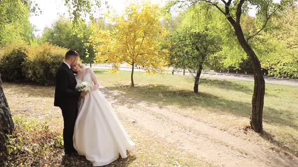 Bride and Groom Kissing Happy Brides