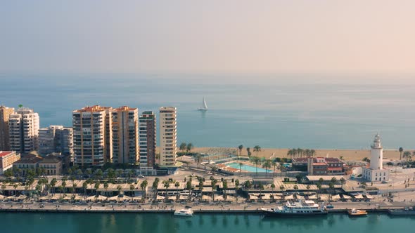 Aerial View of White Yacht Floating Near Coastline