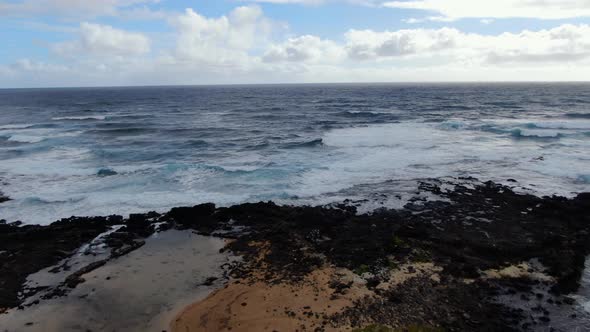 drone panorama of hawaiian beach on a gloomy day