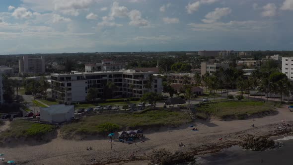 aerial panning at high speeds along the beach in florida