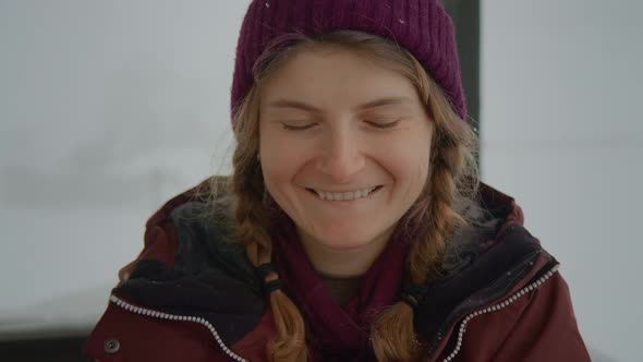 Portrait of Young Woman in Winter Jacket Smile