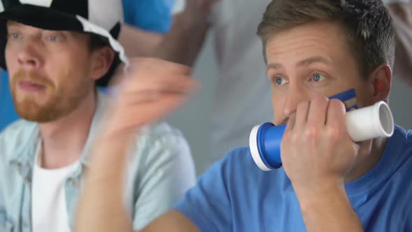 Argentinian Football Supporters Celebrating National Team Success in Competition