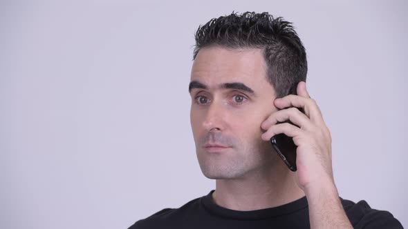 Closeup of Handsome Man Talking on the Phone