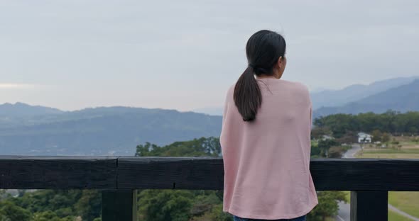 Woman enjoy the view at countryside