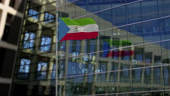 Equatorial Guinea Flag Waving On A Skyscraper Building