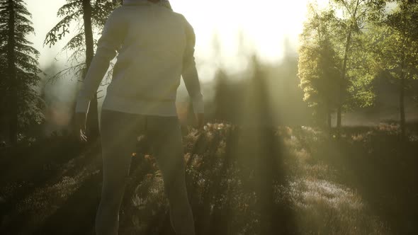 Young Woman Standing Alone Outdoor with Wild Forest Mountains alt