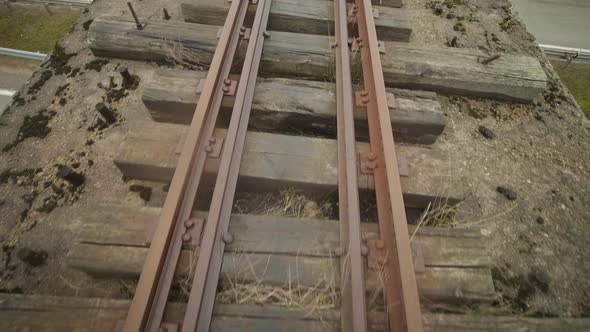 Abandoned Narrow Gauge Railway on the Bridge Over Raod, Autumn Day