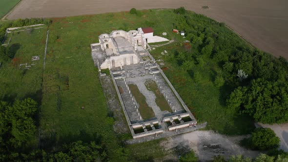 Drone flight above the ruins of old church