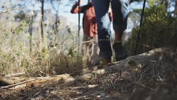 Close up view of senior couple walking on mountains