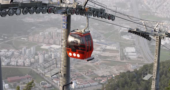 Cabin Descends Cable Car with Beautiful Cityscape