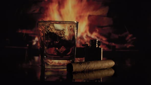 Glass of Alcohol Near the Fireplace