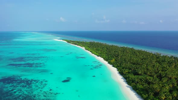 Luxury drone abstract view of a white sand paradise beach and blue sea background in best quality 4K