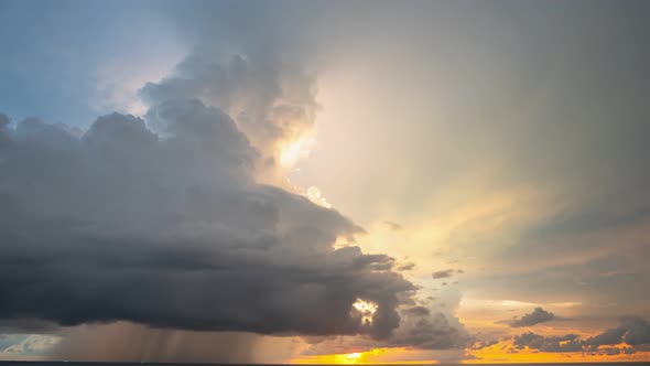 Time Lapse Beautiful Rain Cloud At Sunset Over Sea Water.