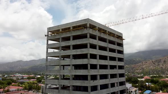 Development of a new high rise multi-story building in Asian capital city, South East Asia. Aerial d