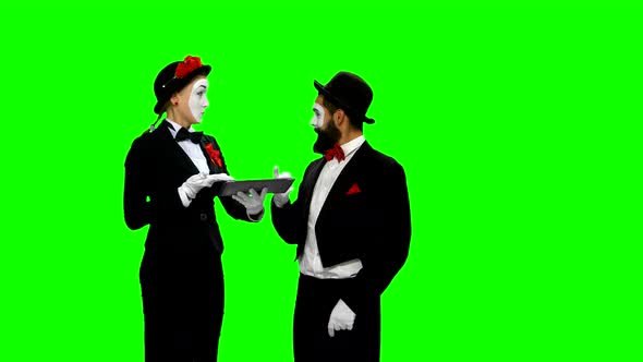 Two Memes Watches Something Using Tablet Computer on Green Screen