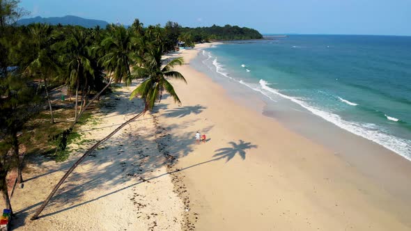 Couple on Vacation in Thailand Chumpon Province White Tropical Beach with Palm Trees Wua Laen Beach