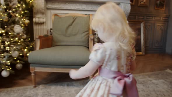 Little Girl Dancing on Christmas at Home