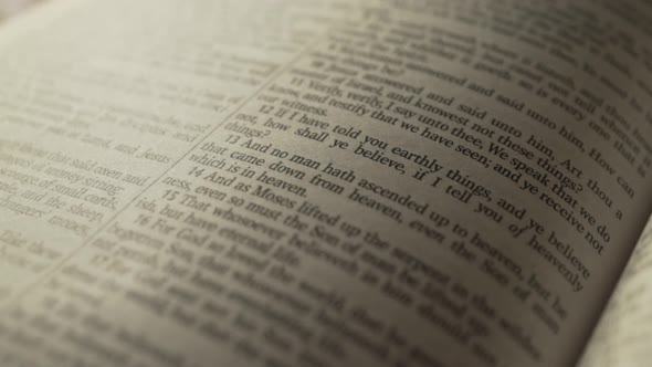 Closeup macro shot of Bible text, religious scripture