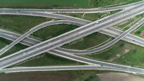 Aerial view of highway and overpass. Road junction, highway intersection top view