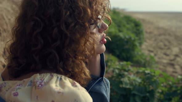 Side View Attractive Girl Face in Sunglasses Close Up