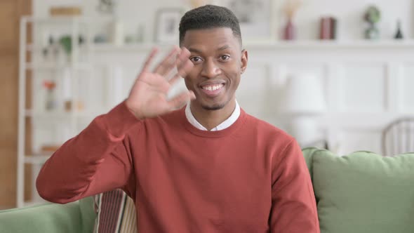 Portrait of African Man Waving, Welcoming