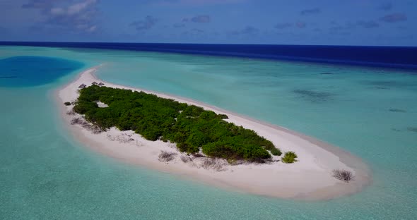 Natural overhead copy space shot of a paradise sunny white sand beach and blue water background in 4